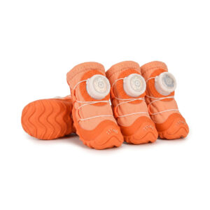 Tangerine orange water resistant dog shoes showcasing vibrant orange canvas uppers and grey rotating wire dials.