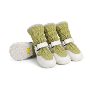 Water-resistant winter dog boots in sage green showing an extended long sleeve chassis and white rubber outsoles.