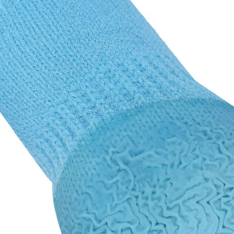 Detailed macro shot of the integrated rubber protective coating rim on waterproof bottom dog socks.