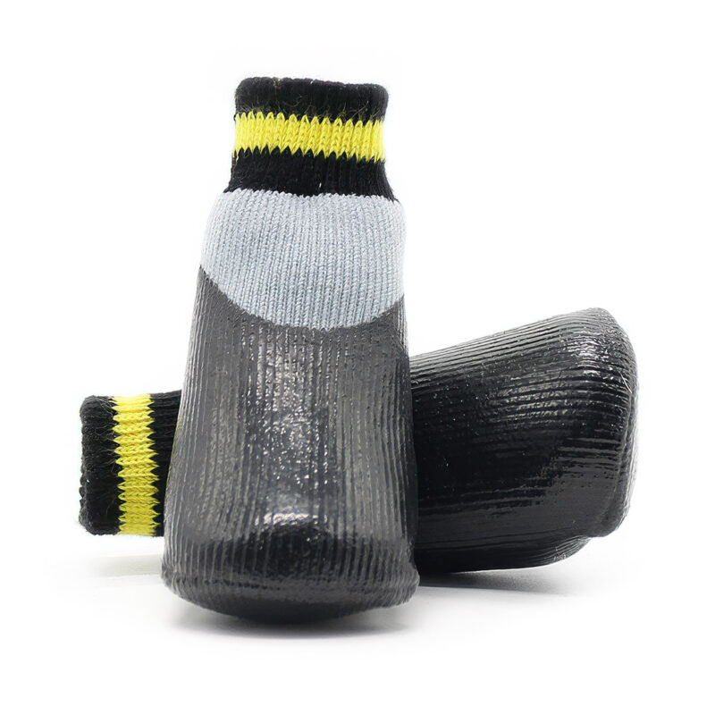 Detailed front and side view of silver gray waterproof dipped dog booties showing the textured latex tread.