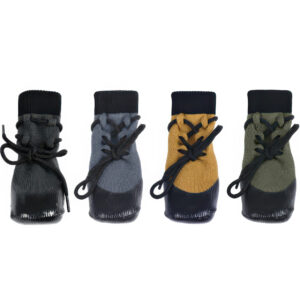 Four color variants of stay-on socks for active dogs including black, gray, tan, and green color options.