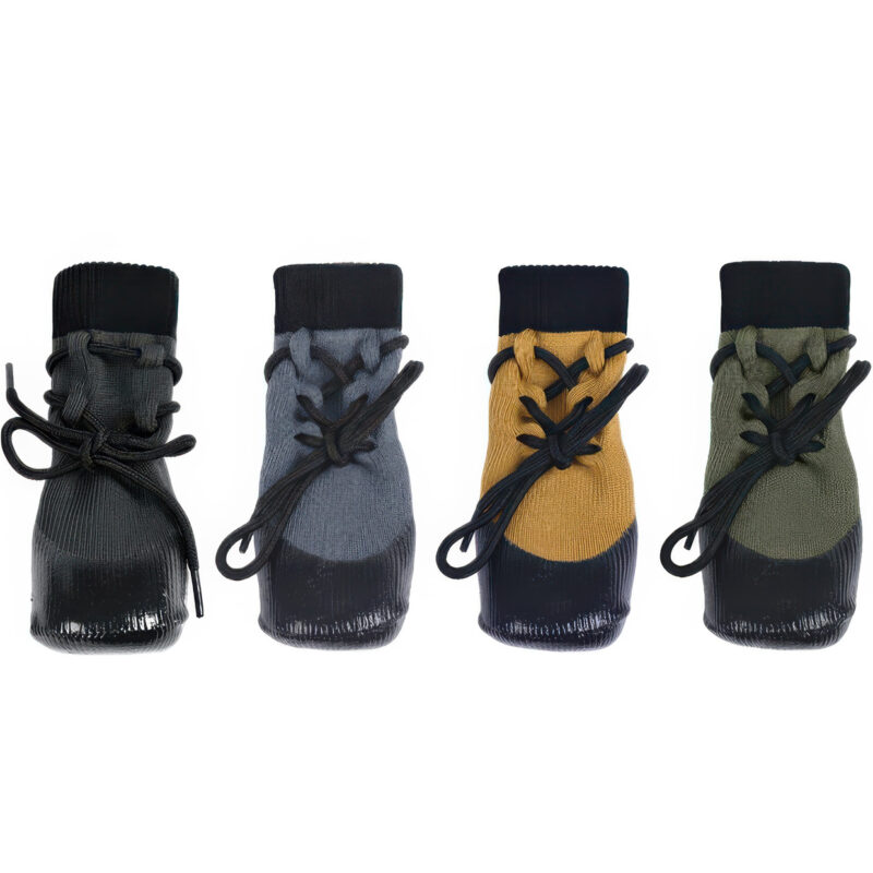 Four color variants of stay-on socks for active dogs including black, gray, tan, and green color options.