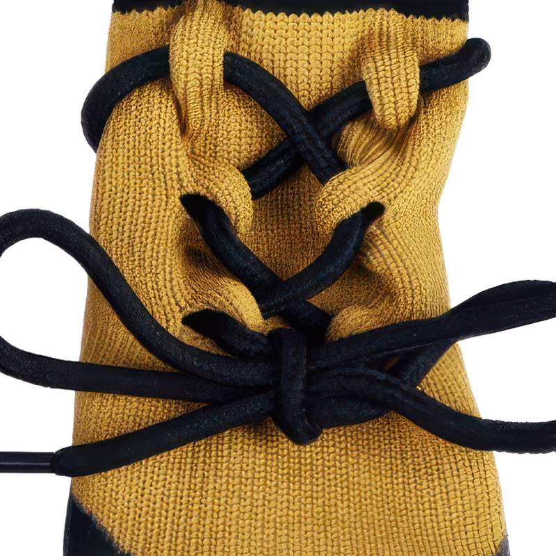 Macro detail of the high-tension black lacing cord on waterproof lace-up dog socks.
