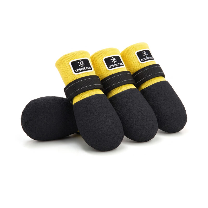 Stay-On Dog Socks in Lemon Yellow Lemon yellow waterproof rubber sole dog socks with adjustable straps for active dogs.