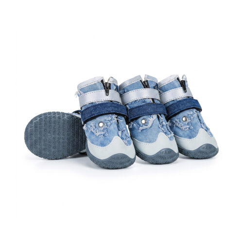 Denim blue zipper denim dog shoes showing the front zipper throat double Velcro straps and gray textured rubber outsoles.